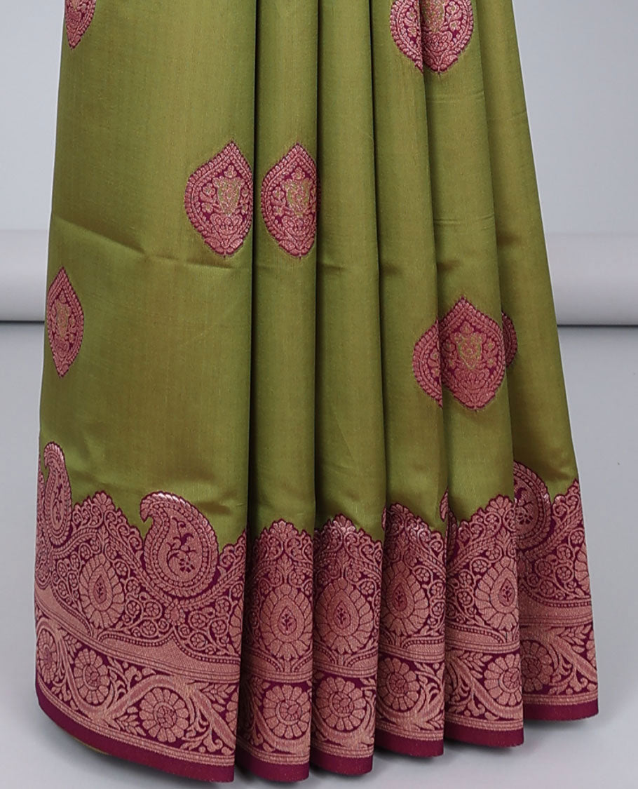 Green butter silk saree with zari buttas, contrast zari border of paisley & floral creeper & intricate pallu