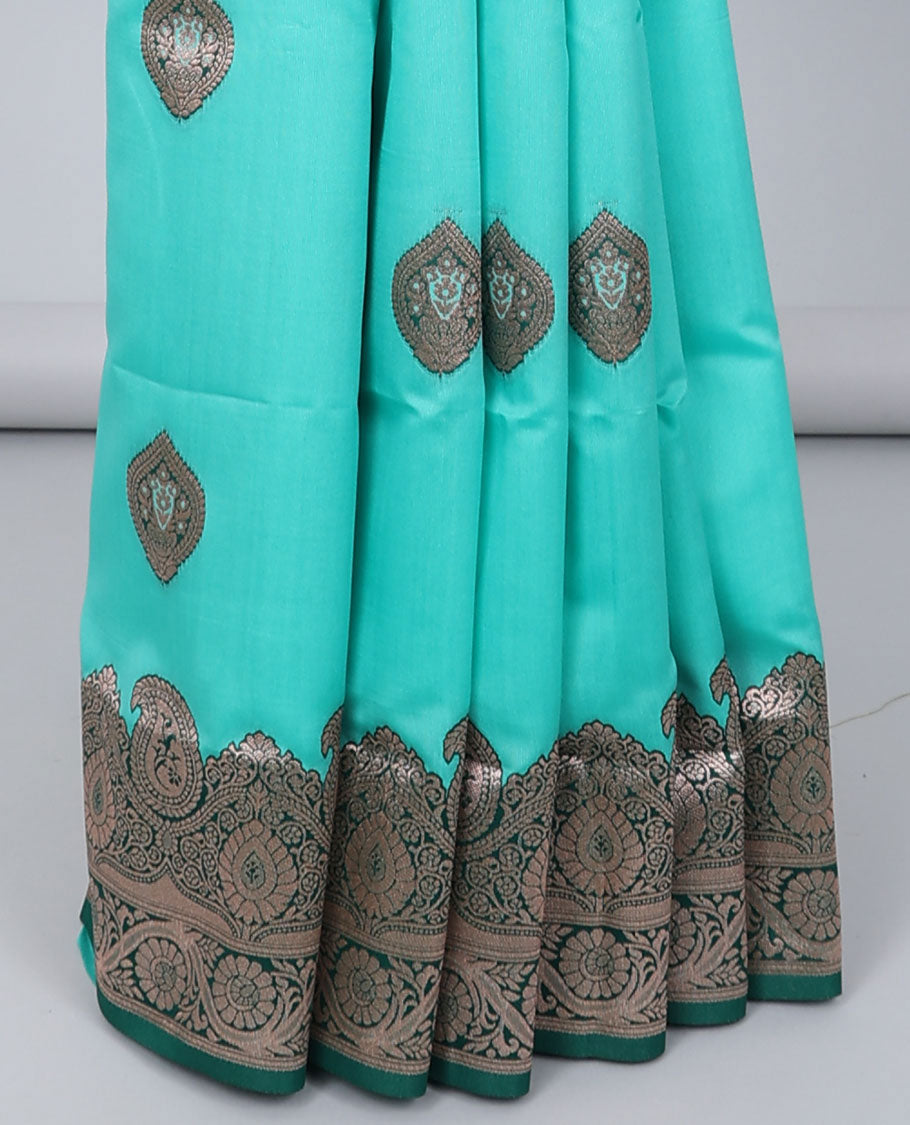 Turquoise butter silk saree with zari buttas, contrast zari border of paisley & floral creeper & intricate pallu