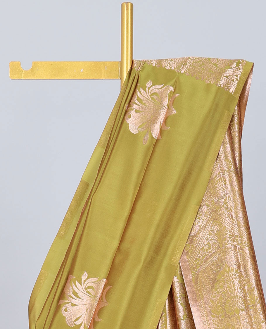 Borderless green butter silk saree with zari buttas, contrast pallu of intricate designs in zari