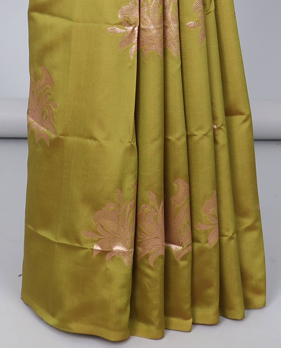 Borderless green butter silk saree with zari buttas, contrast pallu of intricate designs in zari