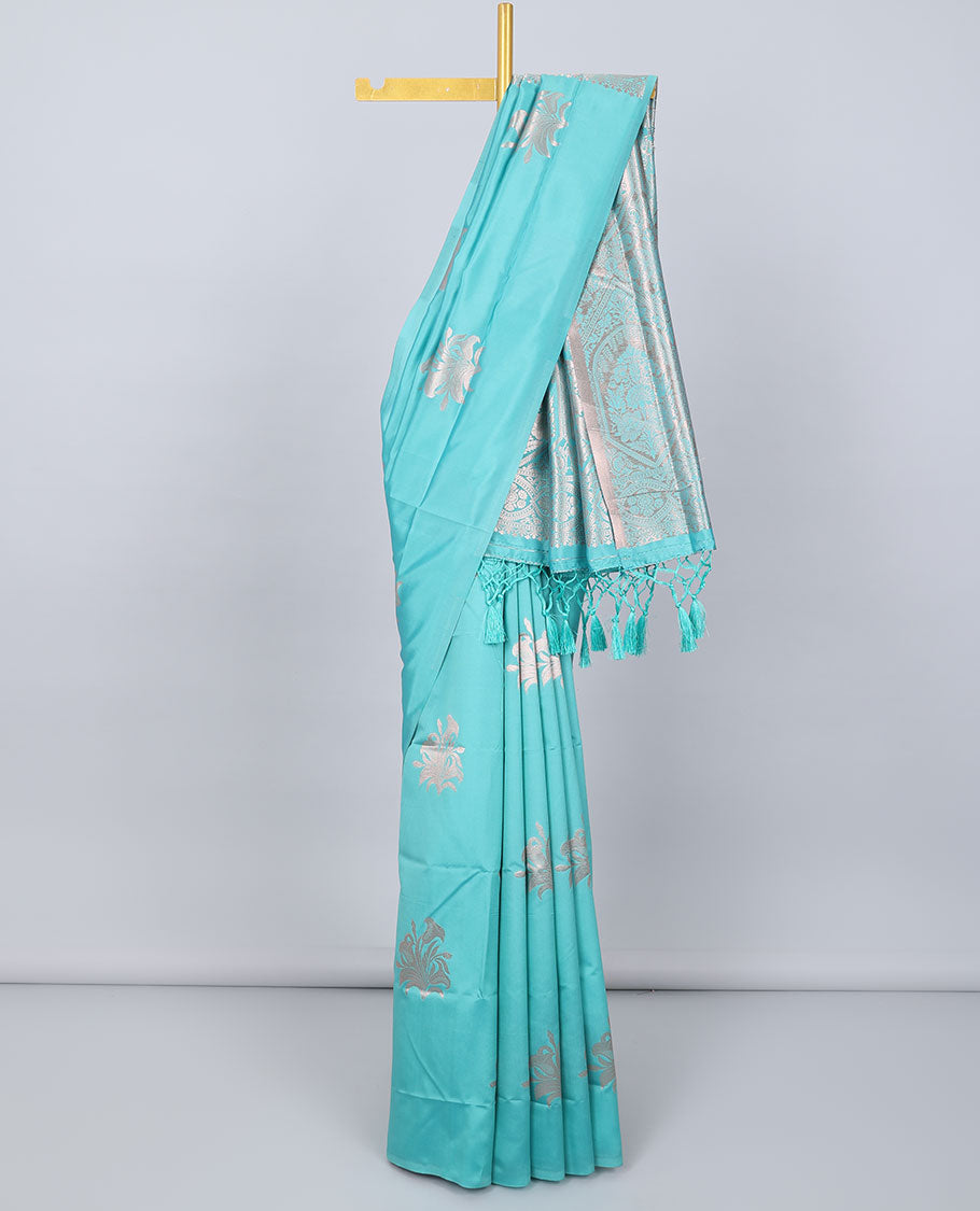 Borderless blue butter silk saree with zari buttas, contrast pallu of intricate designs in zari