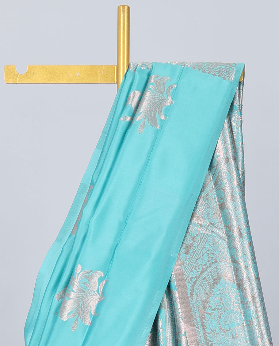 Borderless blue butter silk saree with zari buttas, contrast pallu of intricate designs in zari