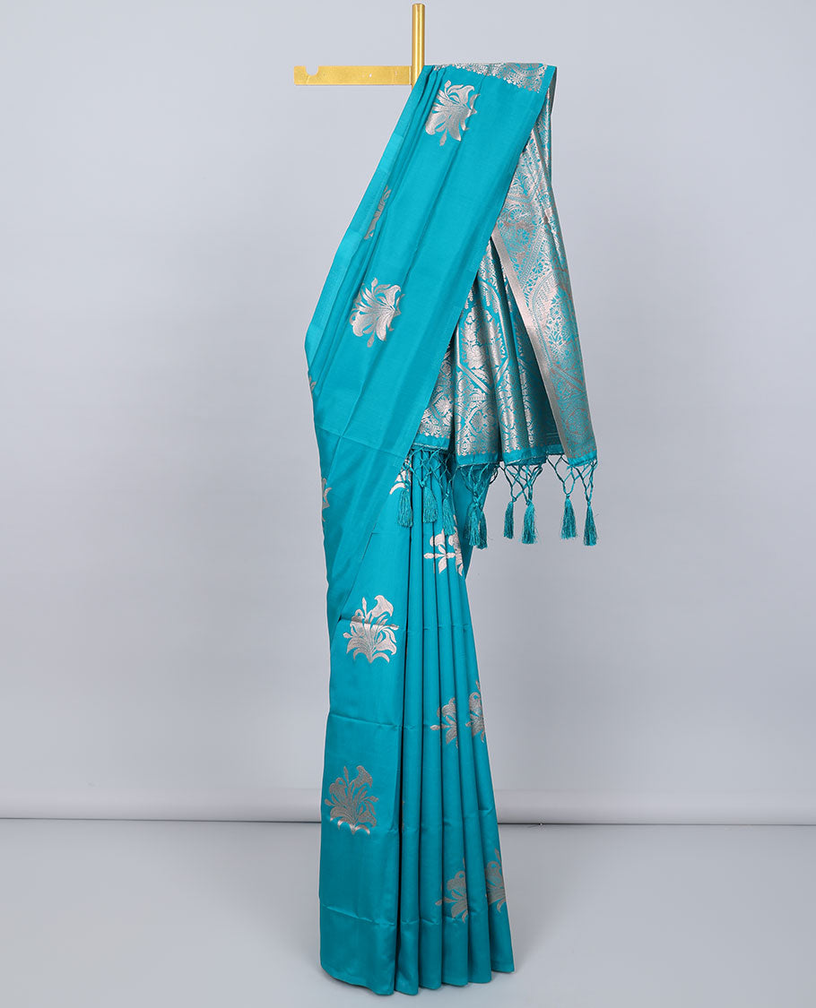 Borderless blue butter silk saree with zari buttas, contrast pallu of intricate designs in zari