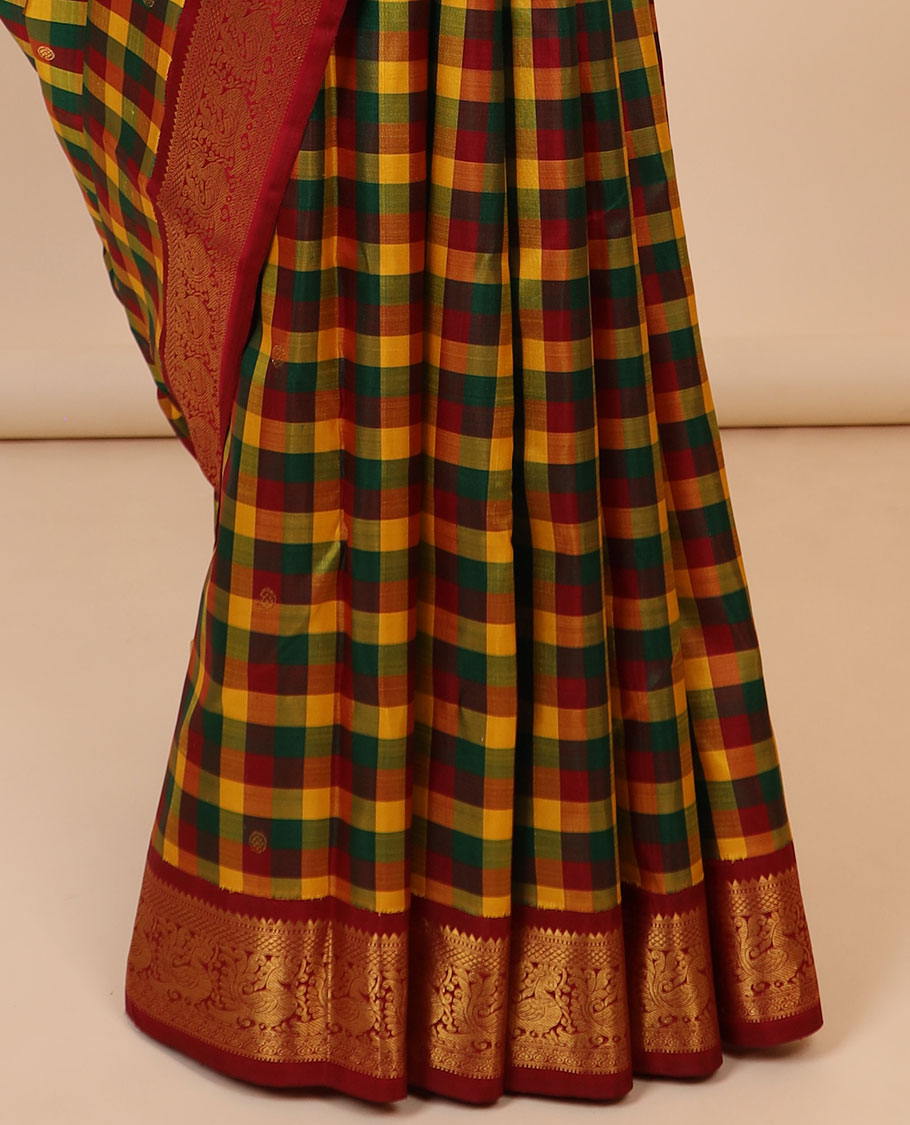 Multi-color checked & butta Kanchipuram silksaree,contrast korvai border of rekku,muthu,mayil,jada nagam & kuyil kann