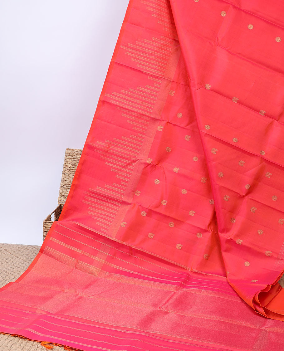 Pink silk saree with mayil chakram buttas, zari border of temple designs & zari-rich pallu of zari stripes