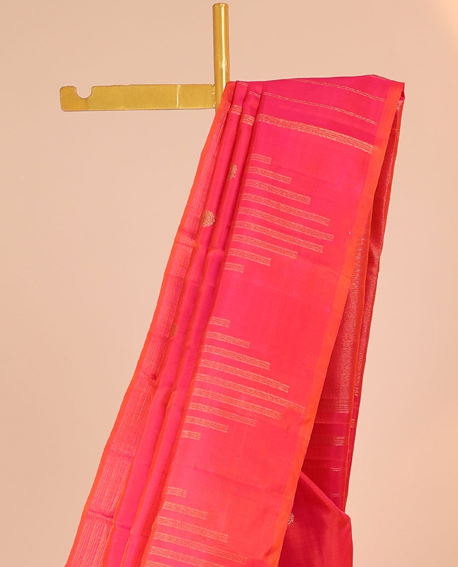 Pink silk saree with mayil chakram buttas, zari border of temple designs & zari-rich pallu of zari stripes