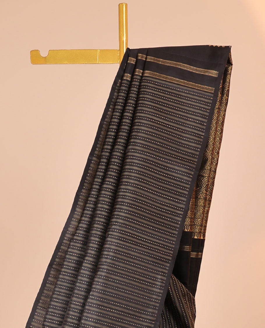 Borderless brown silk saree with zari buttas, self-pallu of thilakam,diamond & dhavana kodi