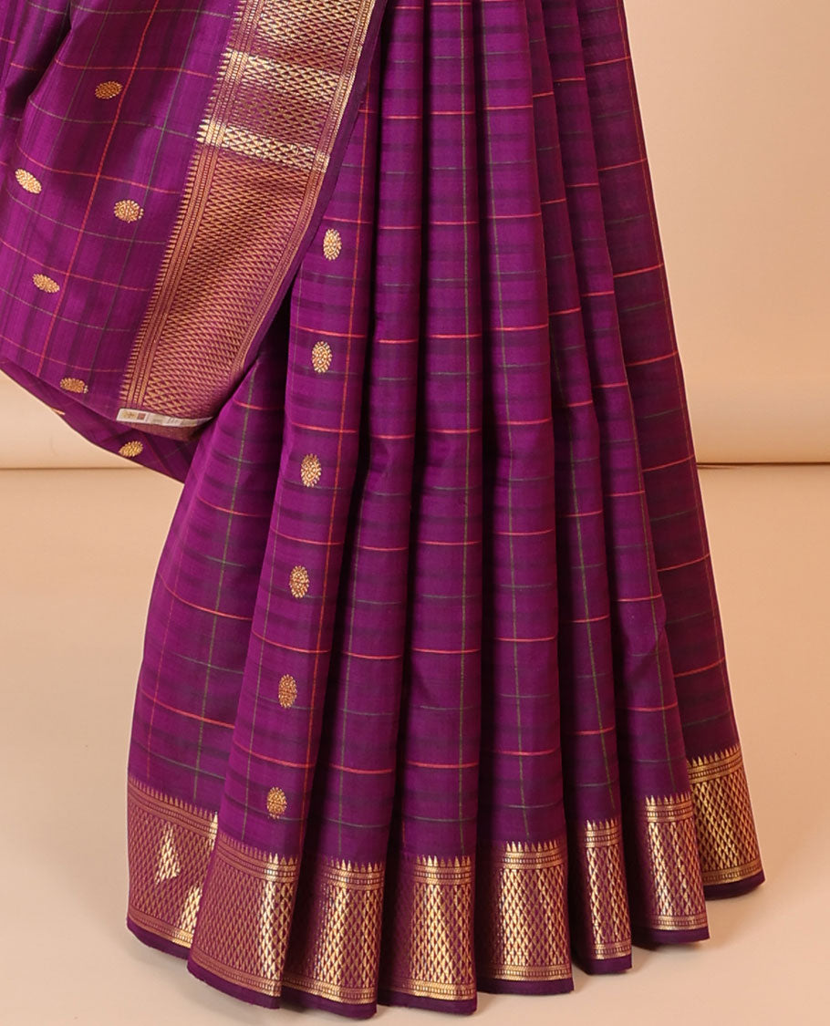 Purple checked silk saree with zari buttas, zari border of rekku,muthu,banaras & ara maadam & pallu of intricate designs
