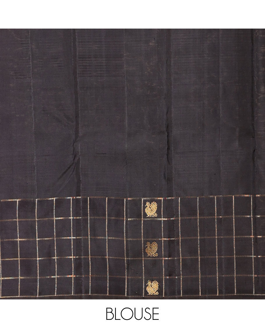 Black striped silk saree, zari checked border of mayil chakram & zari-rich pallu of seppu rekku