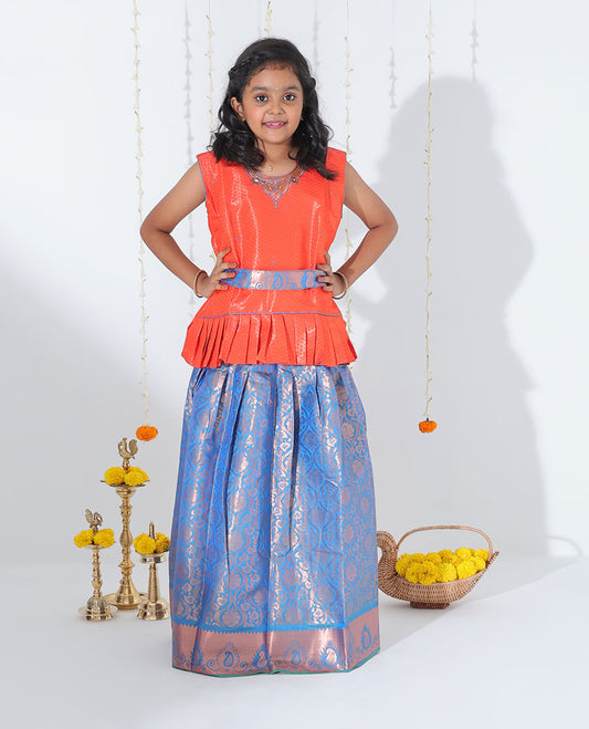 Blue jacquard readymade art silk pavadai with traditional zari border & contrast embossed & embroidery sleeveless blouse