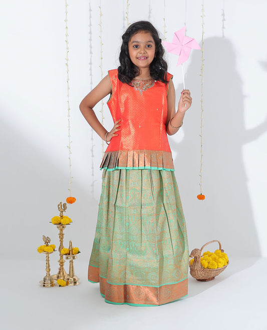 Green jacquard readymade art silk pavadai, traditional zari border & contrast embroidery sleeveless blouse