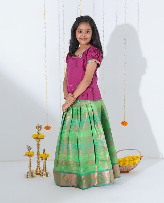 Green jacquard readymade art silk pavadai with contrast traditional design zari border & embroidery puff-sleeve blouse
