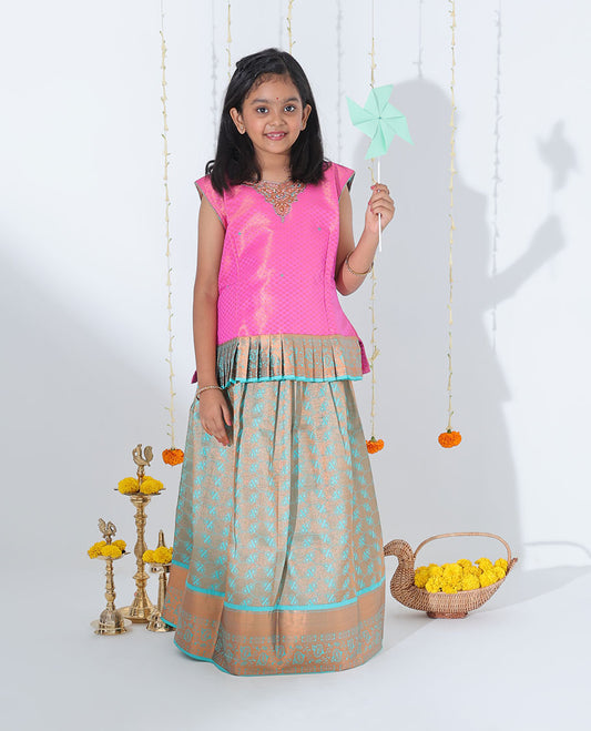 Turquoise jacquard readymade art silk pavadai with zari design border & contrast embroidery sleeveless blouse