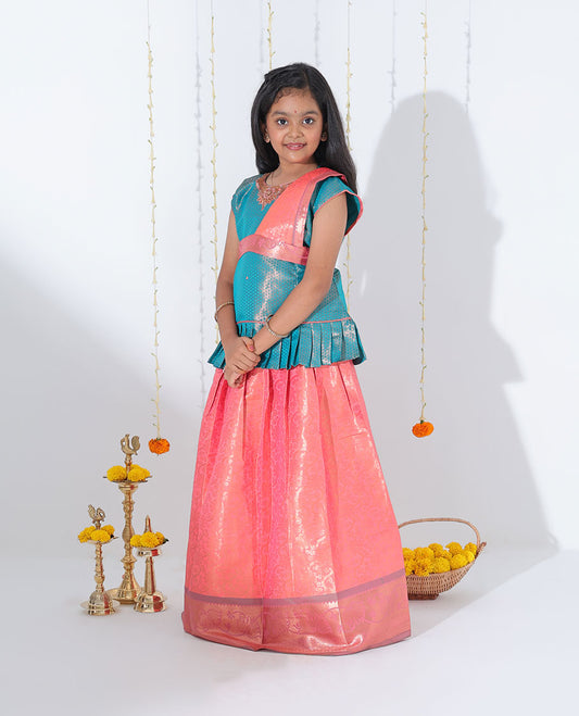 Pink jacquard readymade art silk pavadai with contrast traditional zari design border & embroidery sleeveless blouse