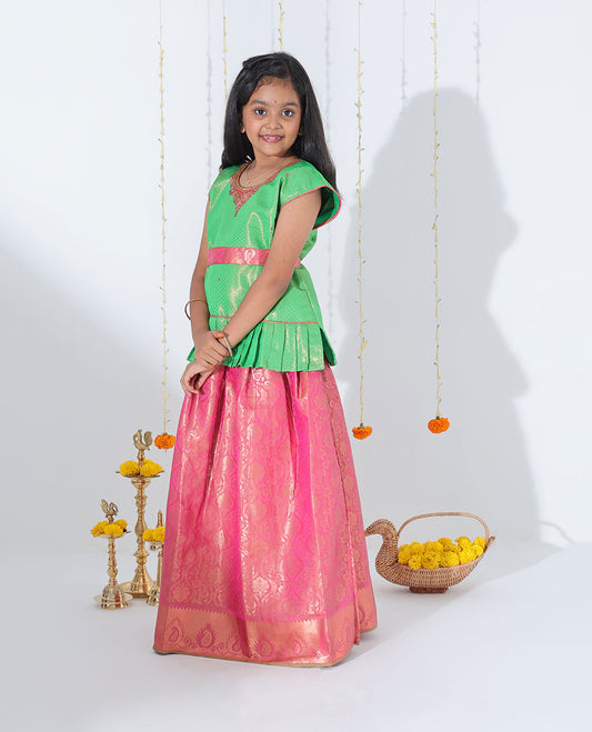Pink jacquard readymade art silk pavadai with traditional zari design border & contrast embroidery sleeveless blouse