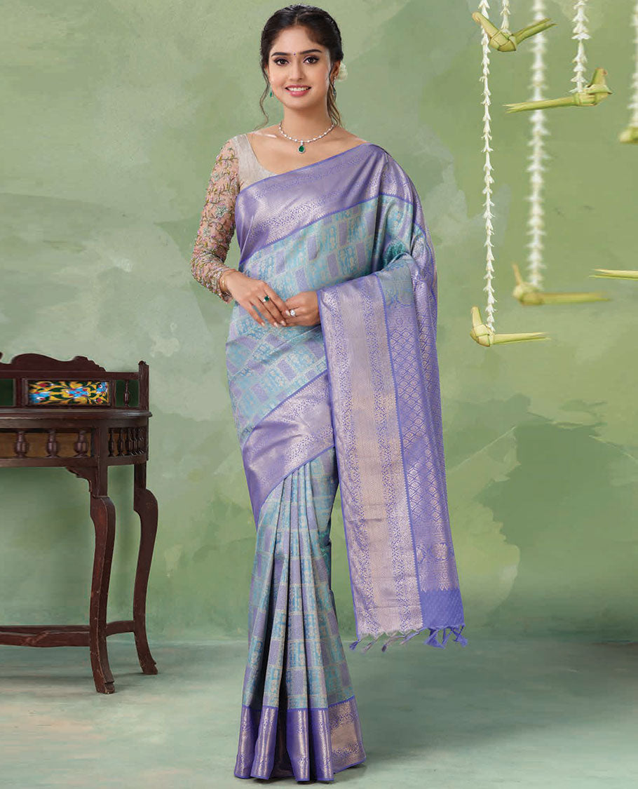 Blue jacquard Kanchipuram wedding silksaree, contrast ogee patterned pallu & border of thilakam,kamalam & mayil kann