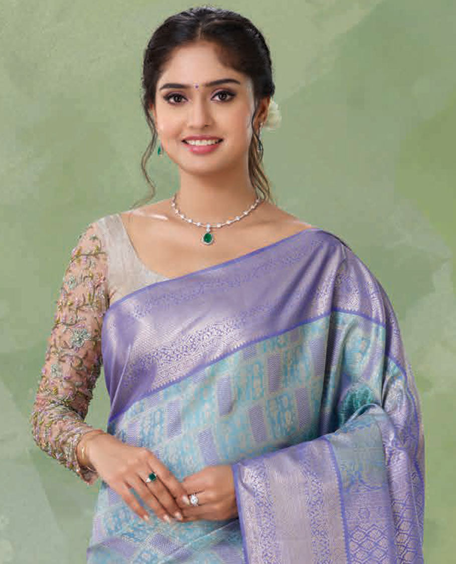 Blue jacquard Kanchipuram wedding silksaree, contrast ogee patterned pallu & border of thilakam,kamalam & mayil kann