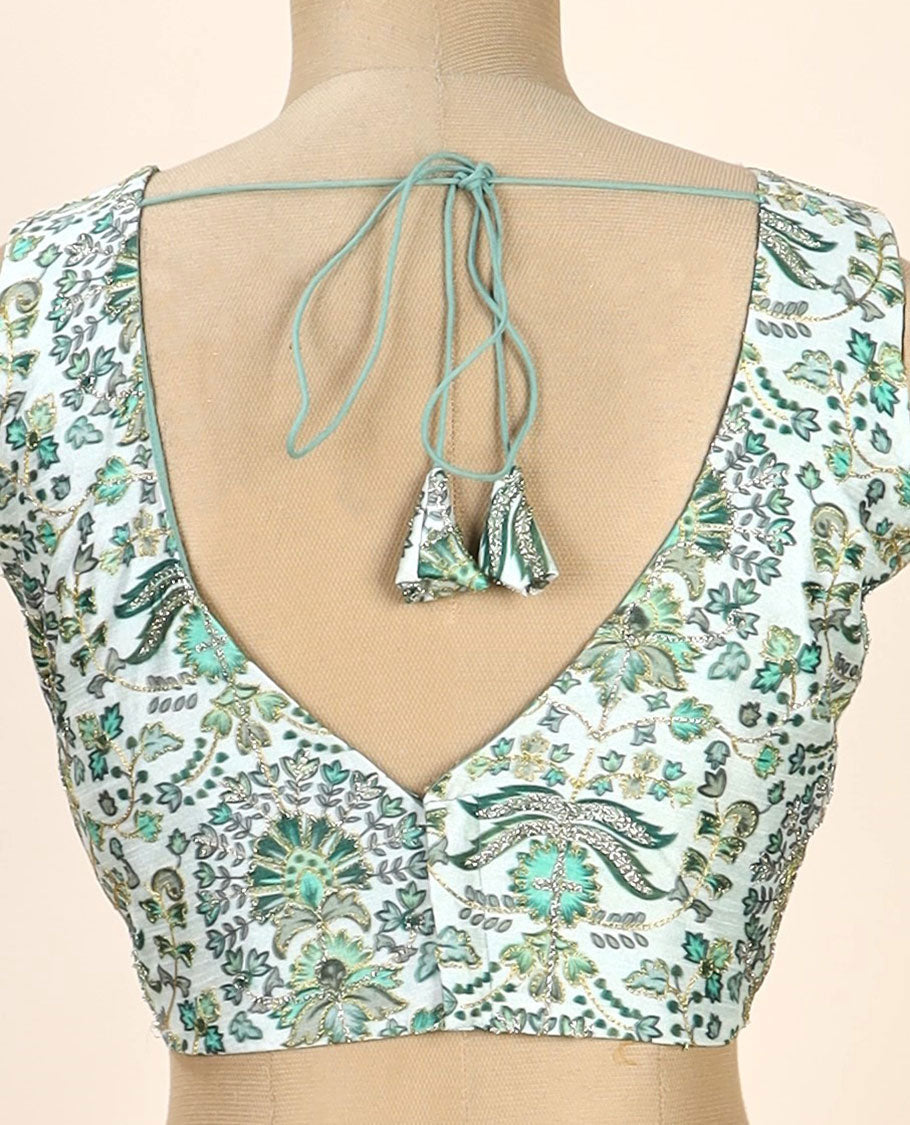 Green intricate floral printed with thread embroidered front and back leaf-neck sleeveless readymade blouse