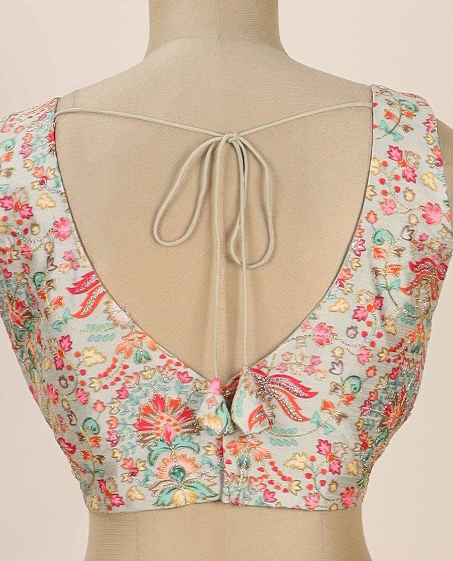 Multi-color intricate floral printed with thread embroidered front and back leaf-neck sleeveless readymade blouse