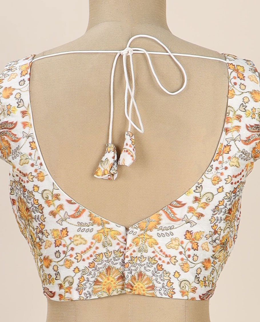 Cream intricate floral printed with thread embroidered front and back leaf-neck sleeveless readymade blouse