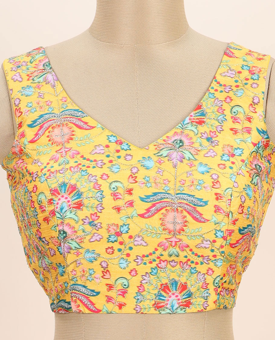 Yellow intricate floral printed with thread embroidered front and back leaf-neck sleeveless readymade blouse