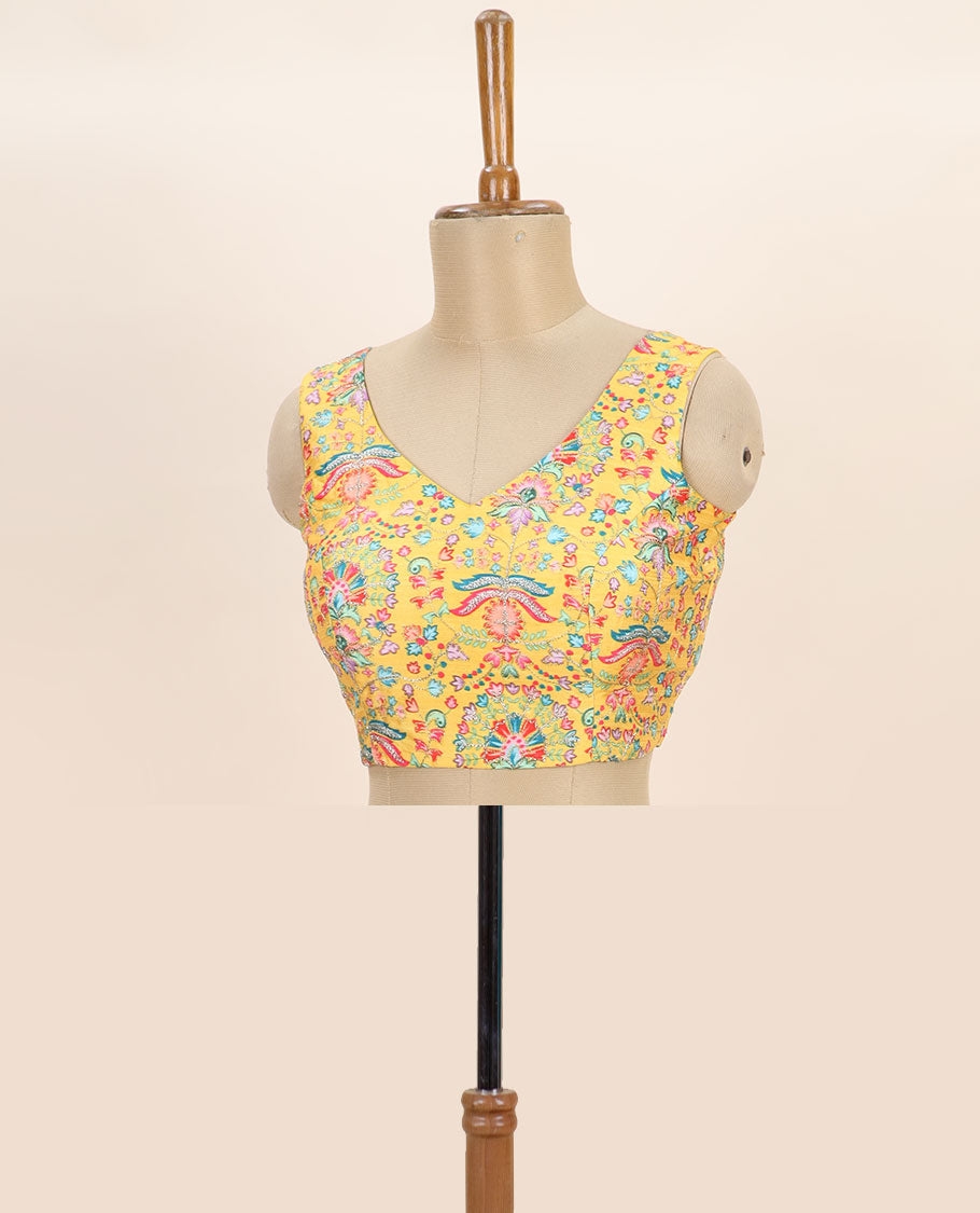 Yellow intricate floral printed with thread embroidered front and back leaf-neck sleeveless readymade blouse