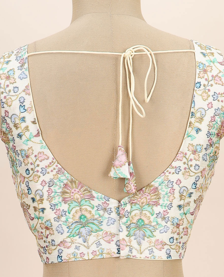 Off-white intricate floral printed with thread embroidered front and back v-neck sleeveless readymade blouse