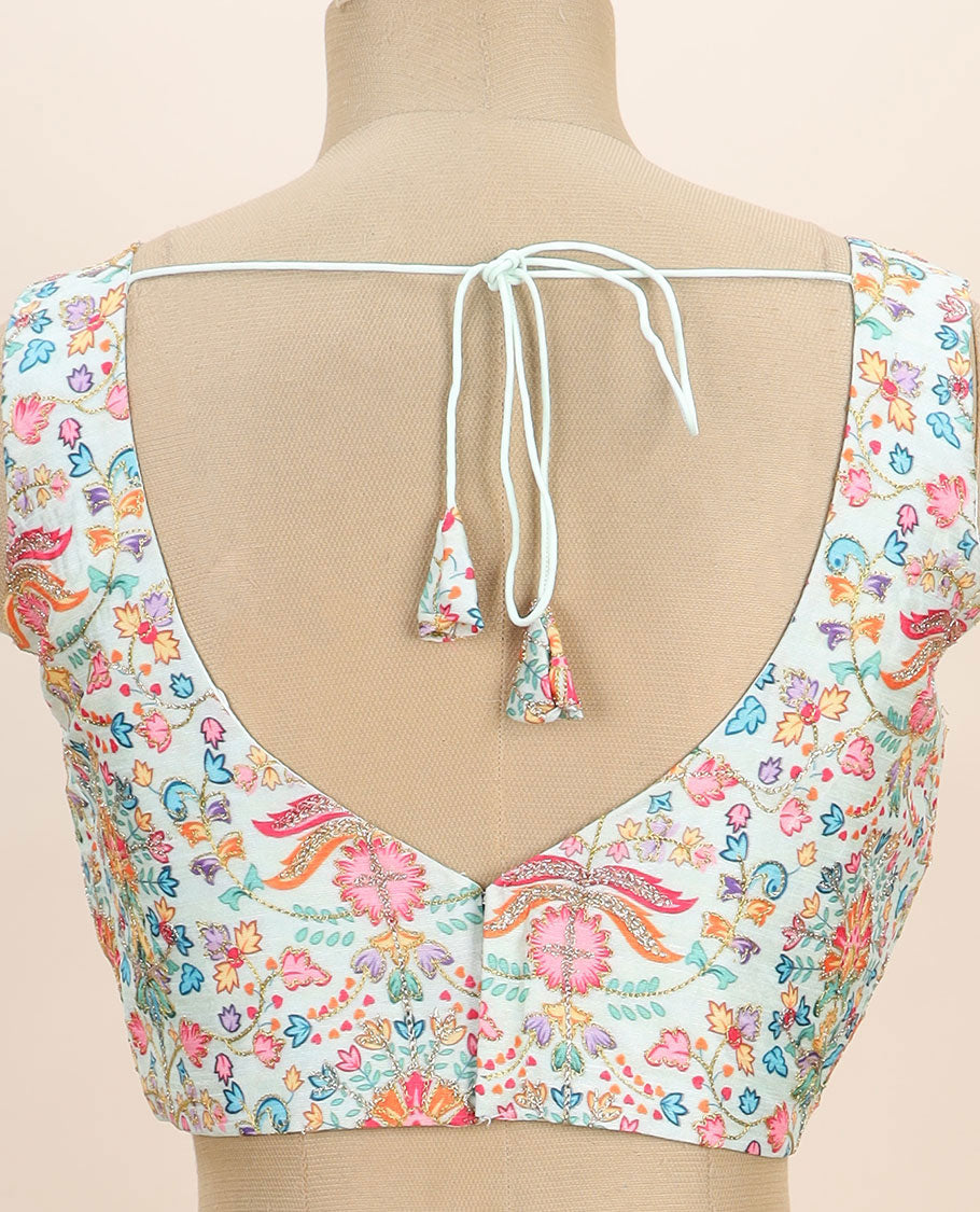 Off-white intricate floral printed with thread embroidered front and back v-neck sleeveless readymade blouse