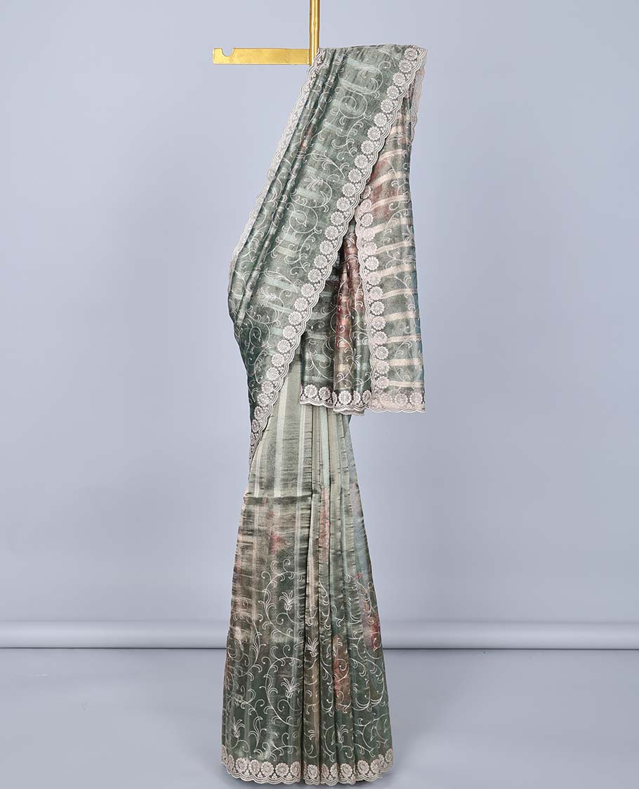 Green floral vine embroidered semi-banaras tissue saree, scallop embroidered border & embroidered pallu