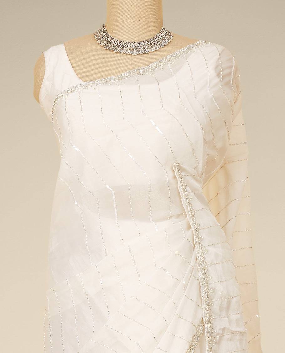 Cream sequins embroidered jimmy choo designer saree, scallop stone embroidered border