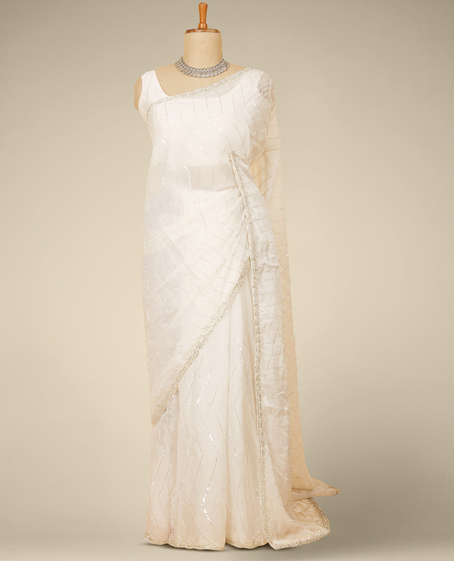 Cream sequins embroidered jimmy choo designer saree, scallop stone embroidered border