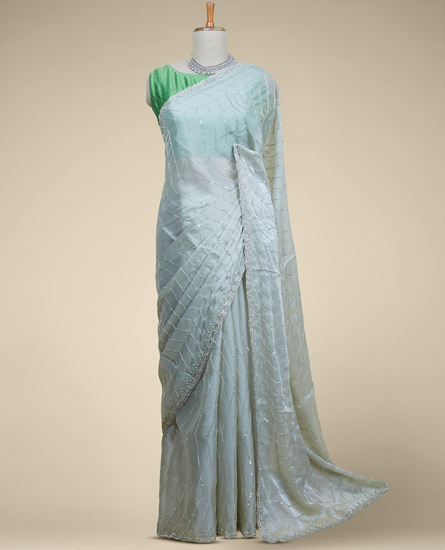 Blue sequins embroidered stripes motifs Jimmy Choo designer saree, scallop stone embroidered border