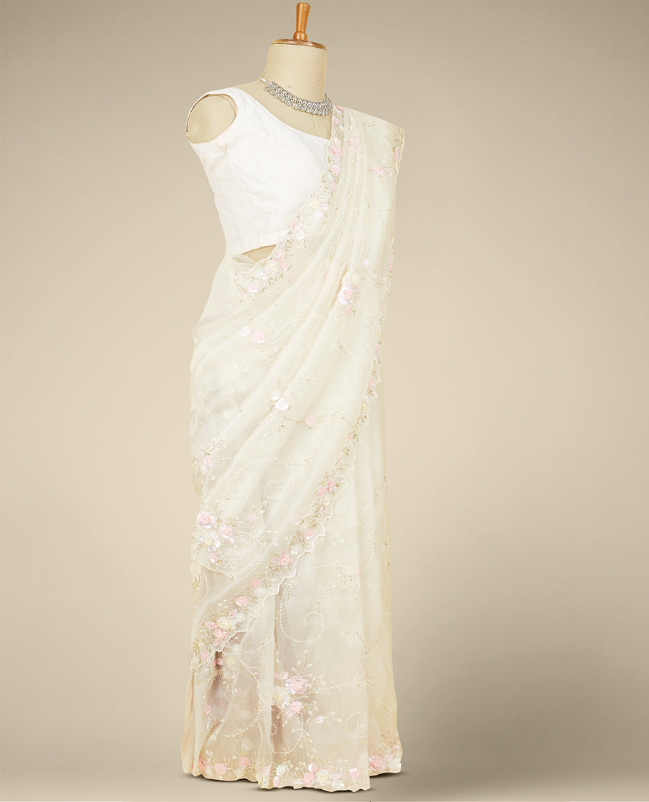Cream floral vine embroidered organza saree, scallop floral vine embroidered border
