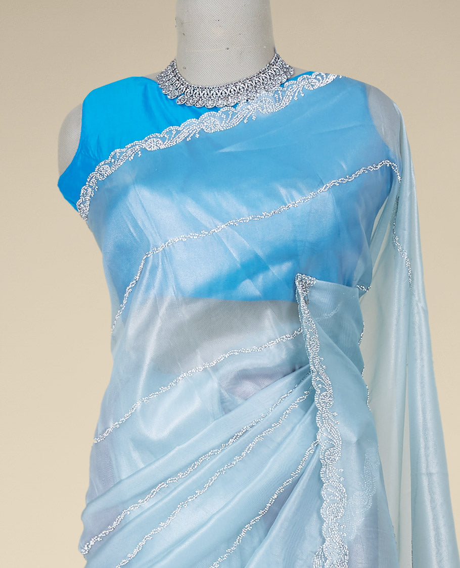 Baby blue stone embroidered Jimmy Choo designer saree, scallop stone embroidered border