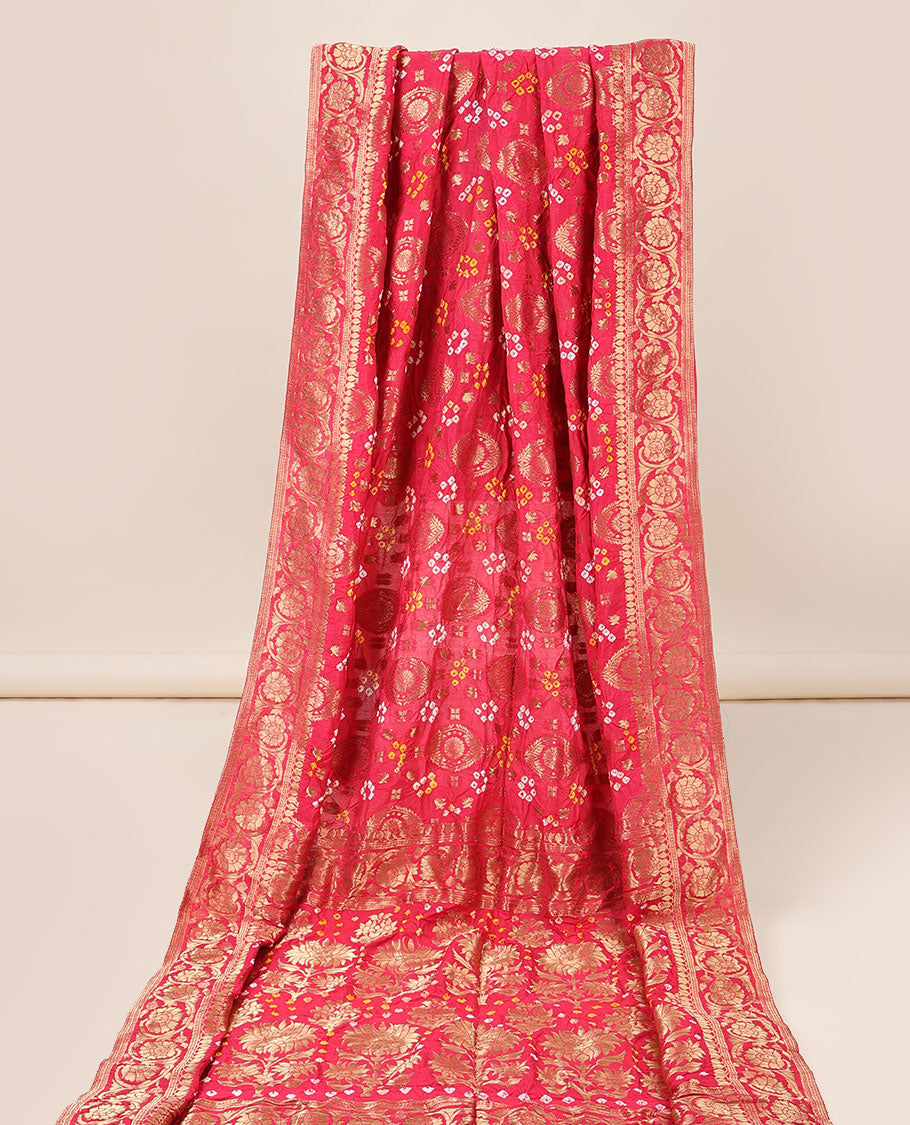 Red bandhani saree with zari buttas & bandhani dots, traditional design border & pallu of floral designs