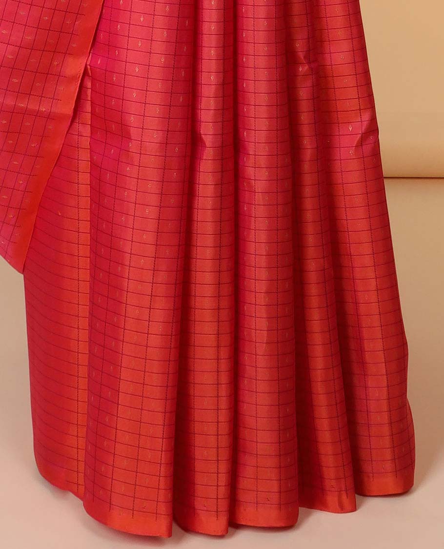 Borderless pink butta enclosed checked kancheepuram silksaree, contrast pallu of traditional designs in zari