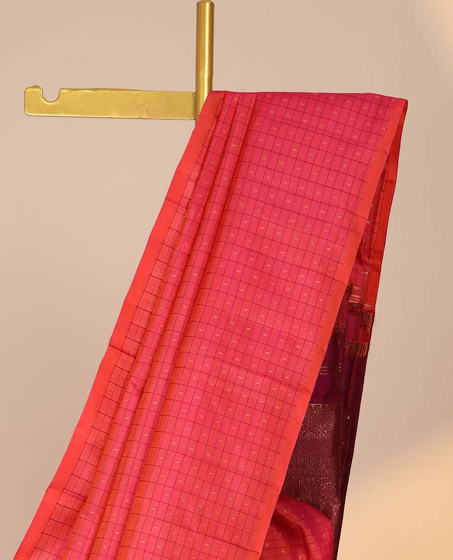 Borderless pink butta enclosed checked kancheepuram silksaree, contrast pallu of traditional designs in zari