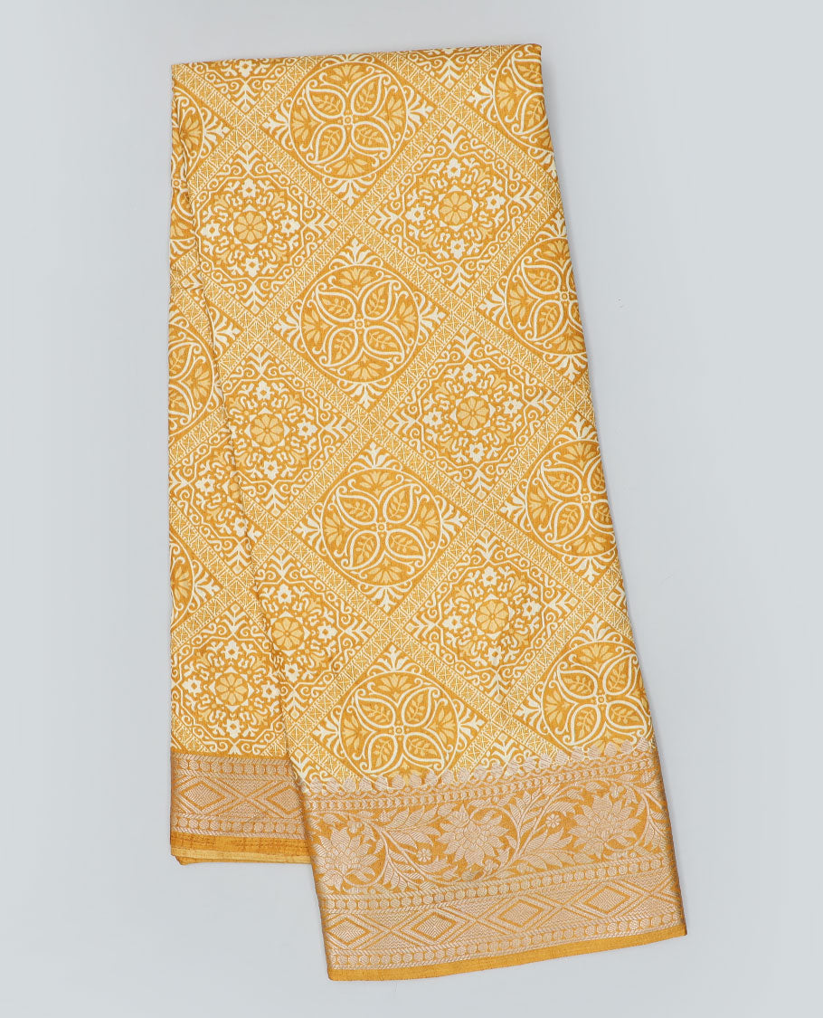 Yellow intricately printed semi-banaras dola saree, traditional zari border