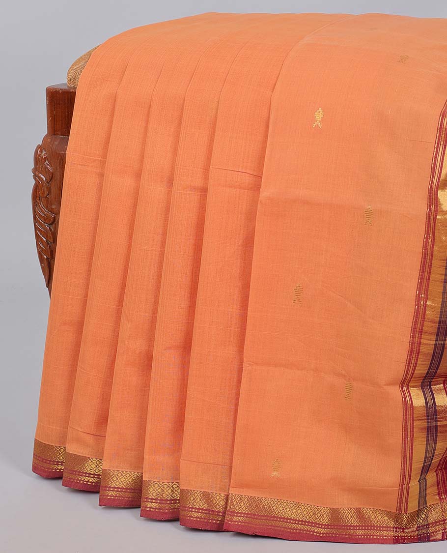 Orange Andhra cotton saree with buttas, contrast traditional design border & butta enclosed checked pallu
