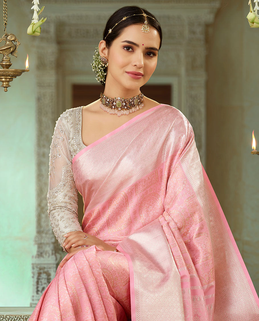 Pink jacquard silk saree, zari enriched geometric border & intricately designed pallu