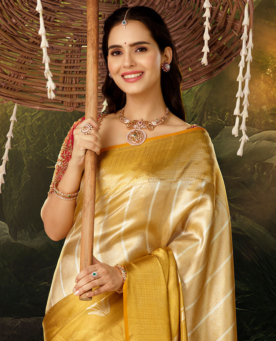 Gold jacquard silk saree, contrast intricate pallu & zari highlighted border steeped with traditional designs