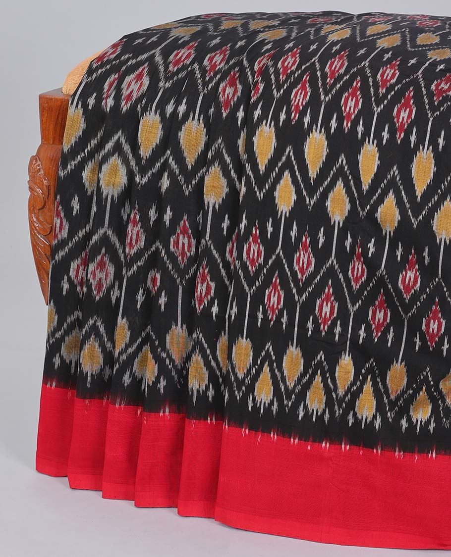 Black intricately designed ikkat cotton saree, contrast border & ikkat design pallu