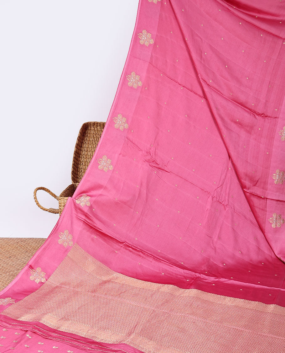 Pink mushru silk saree with buttas, floral motifs border & intricate pallu