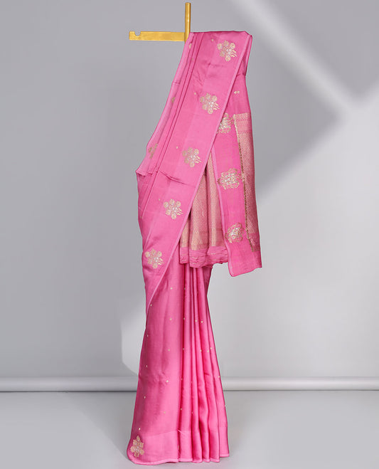 Pink mushru silk saree with buttas,  floral motifs border & intricate pallu