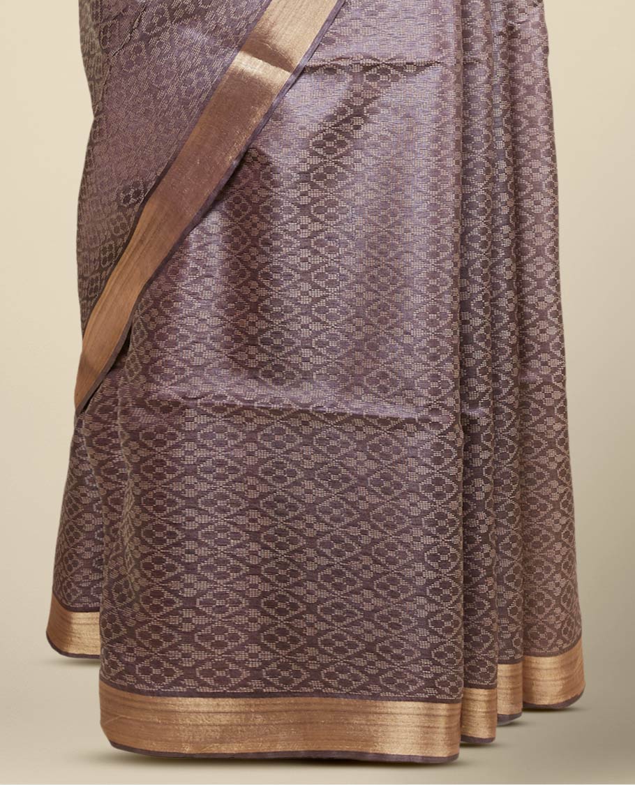 Brown spare intricate ogee patterned tusser silk saree with plain border