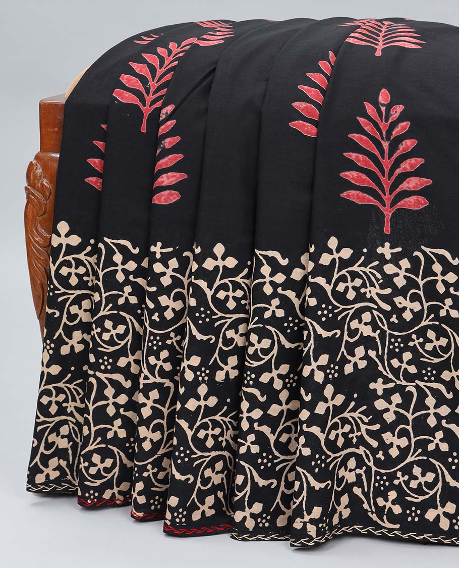 Black linen cotton saree with buttas, floral vine printed border & pallu of geometric & floral print