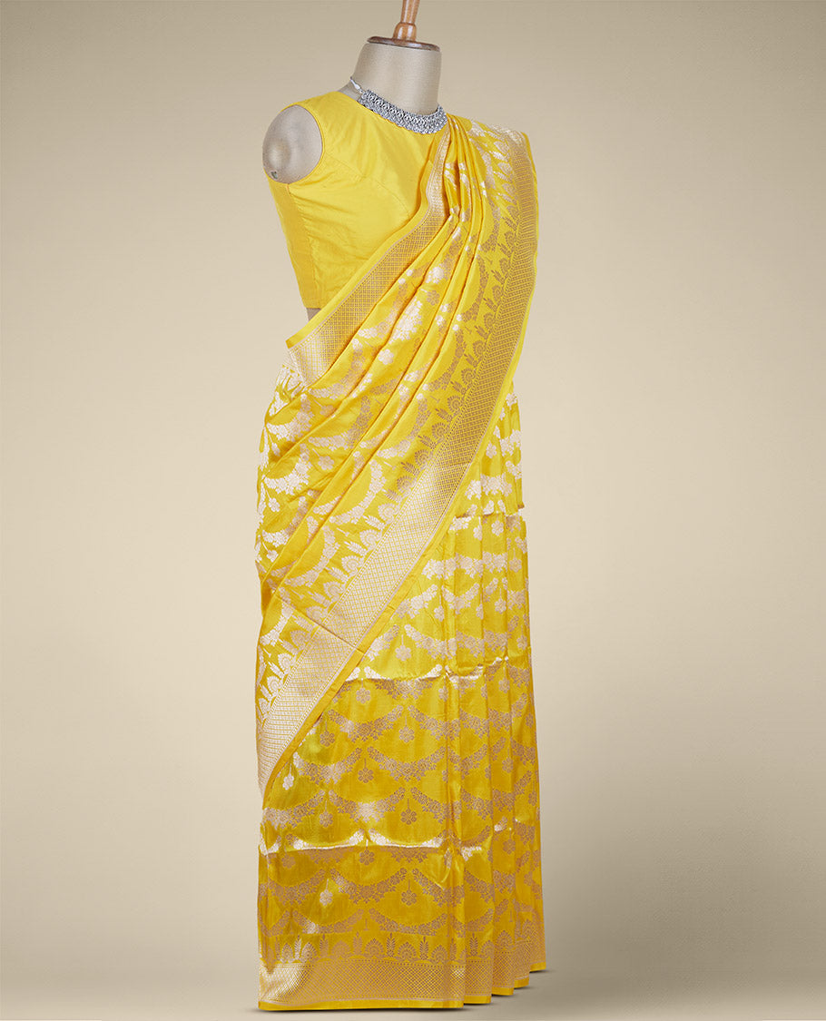 Yellow jacquard design pure banaras silk saree, zari-rich border of intricate design weave