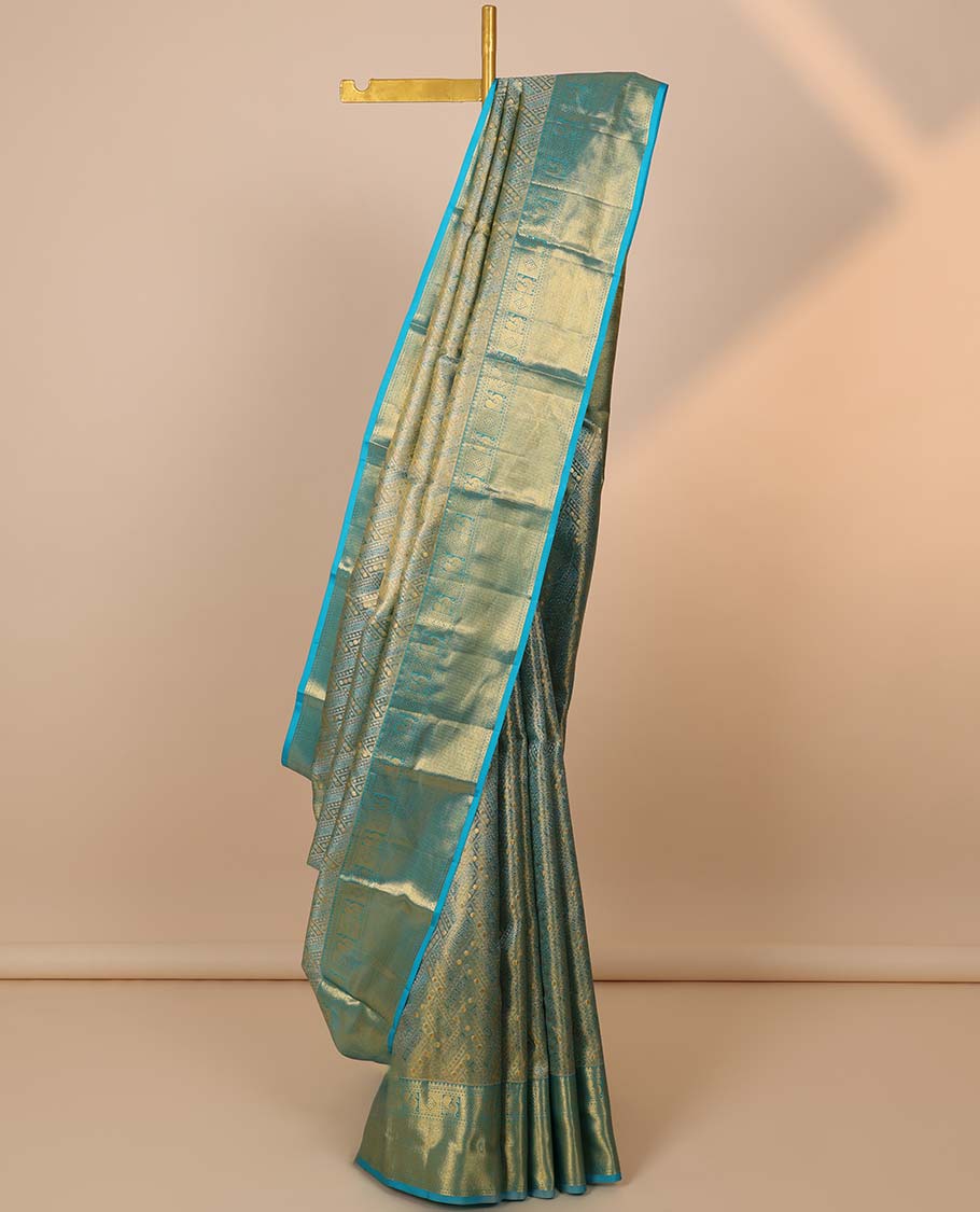 Blue jacquard Kanchipuram tissue silksaree, intricate pallu & border of thilakam mokku,neli,diamond,mayil & vanki