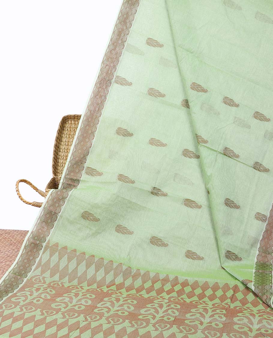Green coimbatore cotton saree with buttas, self-border & pallu of floral & geometric designs