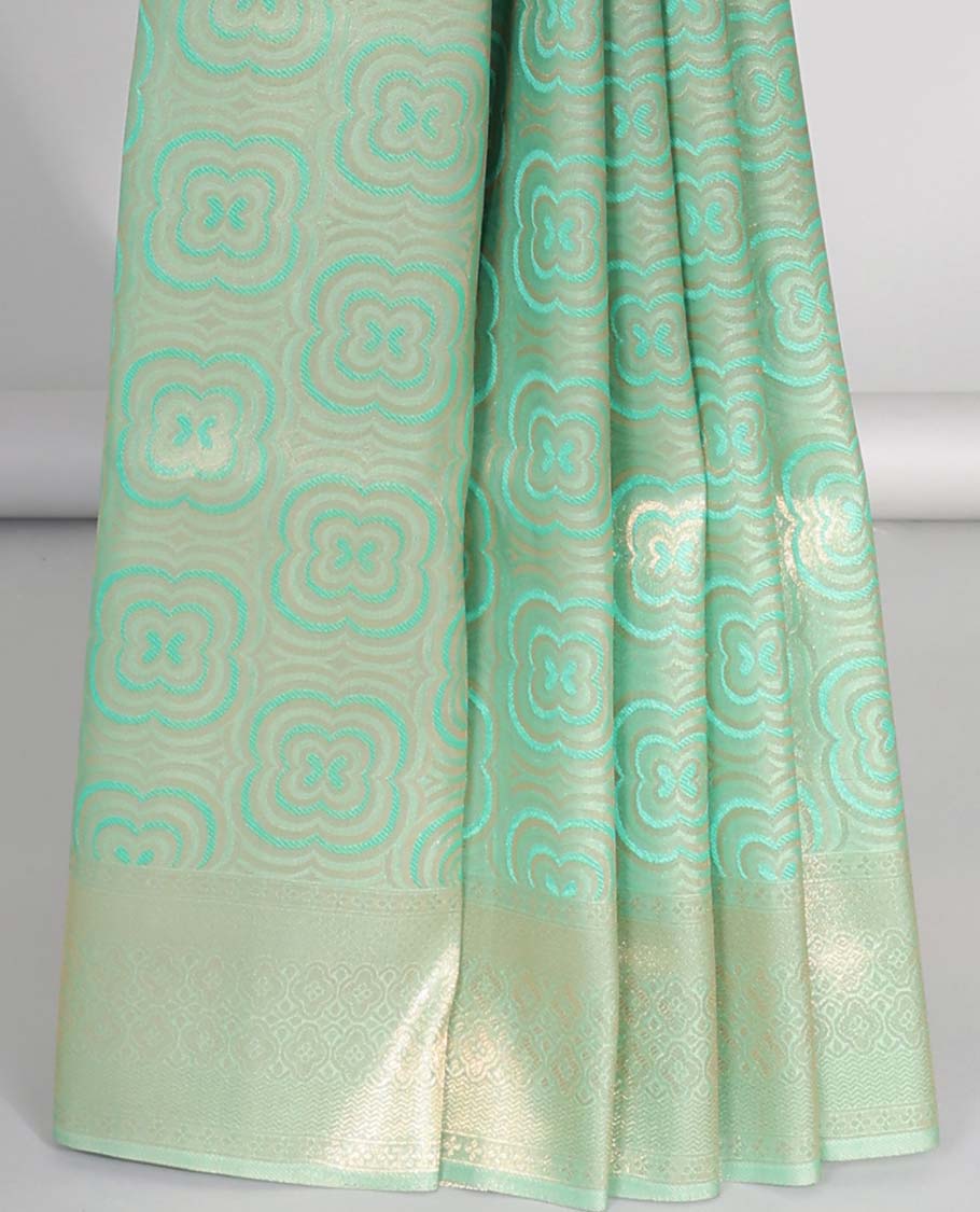 Green geometric softy saree, geometric design border & pallu of intricate designs